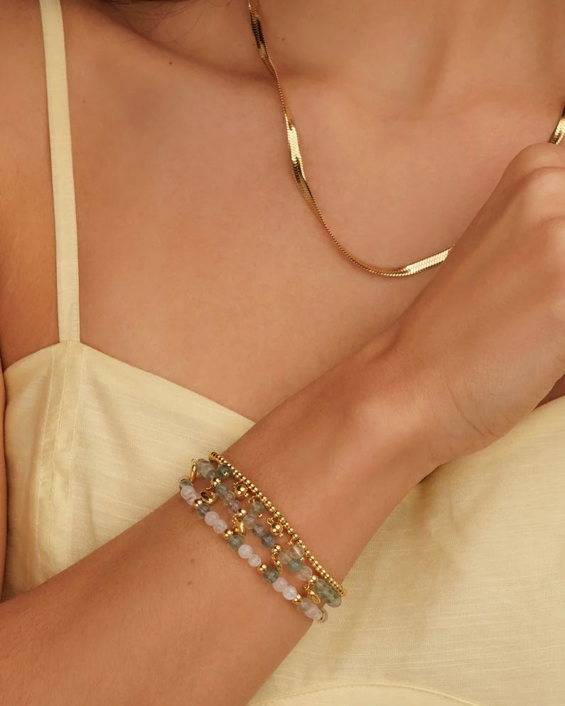 Elastische armband met ronde bedels en Groene Fluoriet