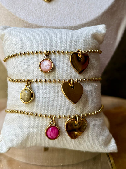 Qoss armband of ketting met hartje