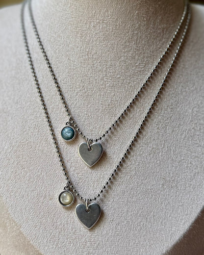 Qoss armband of ketting met hartje