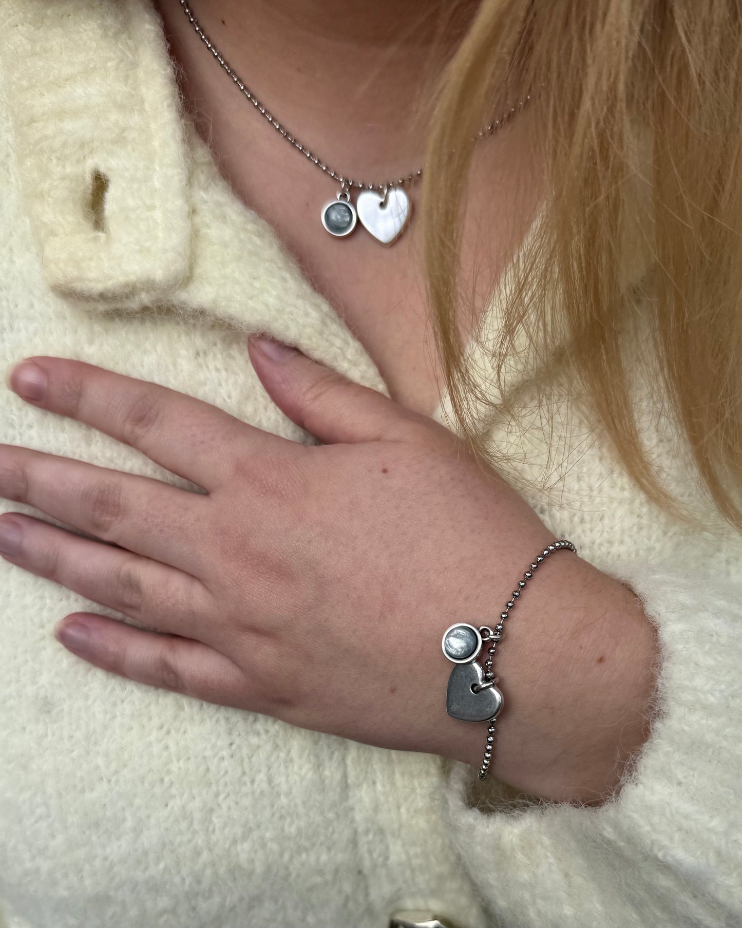 Qoss armband of ketting met hartje