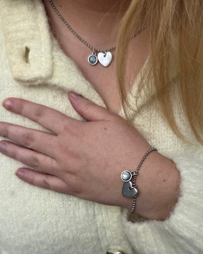 Qoss armband of ketting met hartje