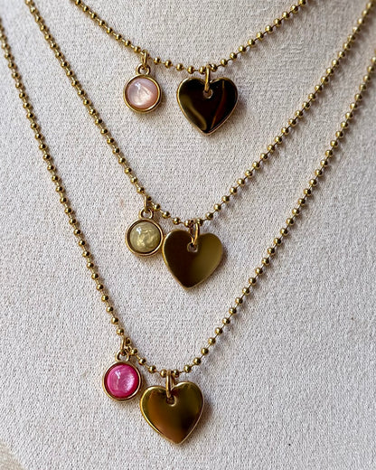 Qoss armband of ketting met hartje