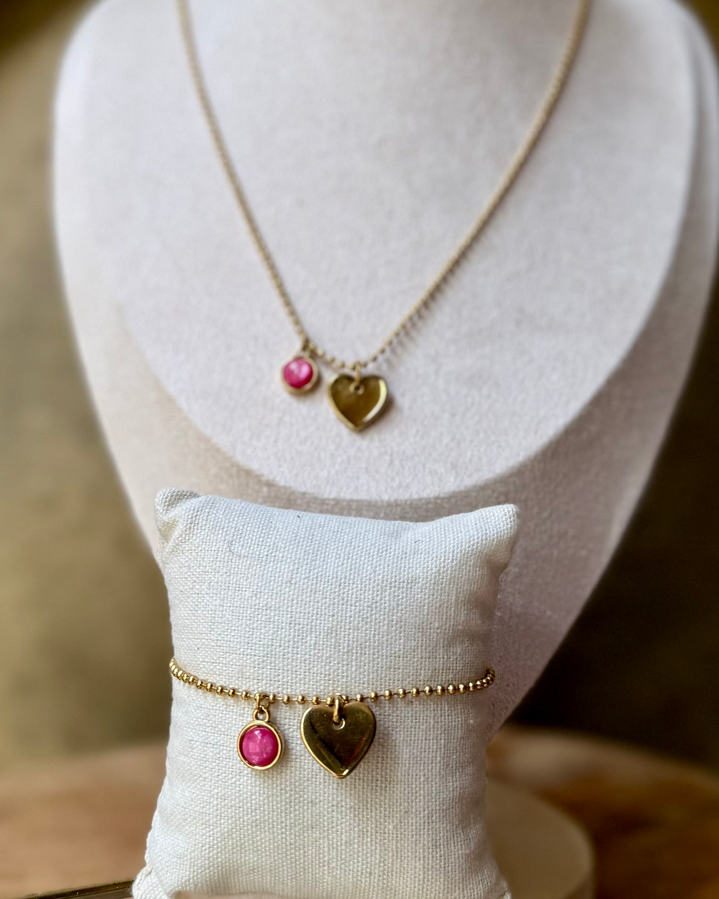 Qoss armband of ketting met hartje