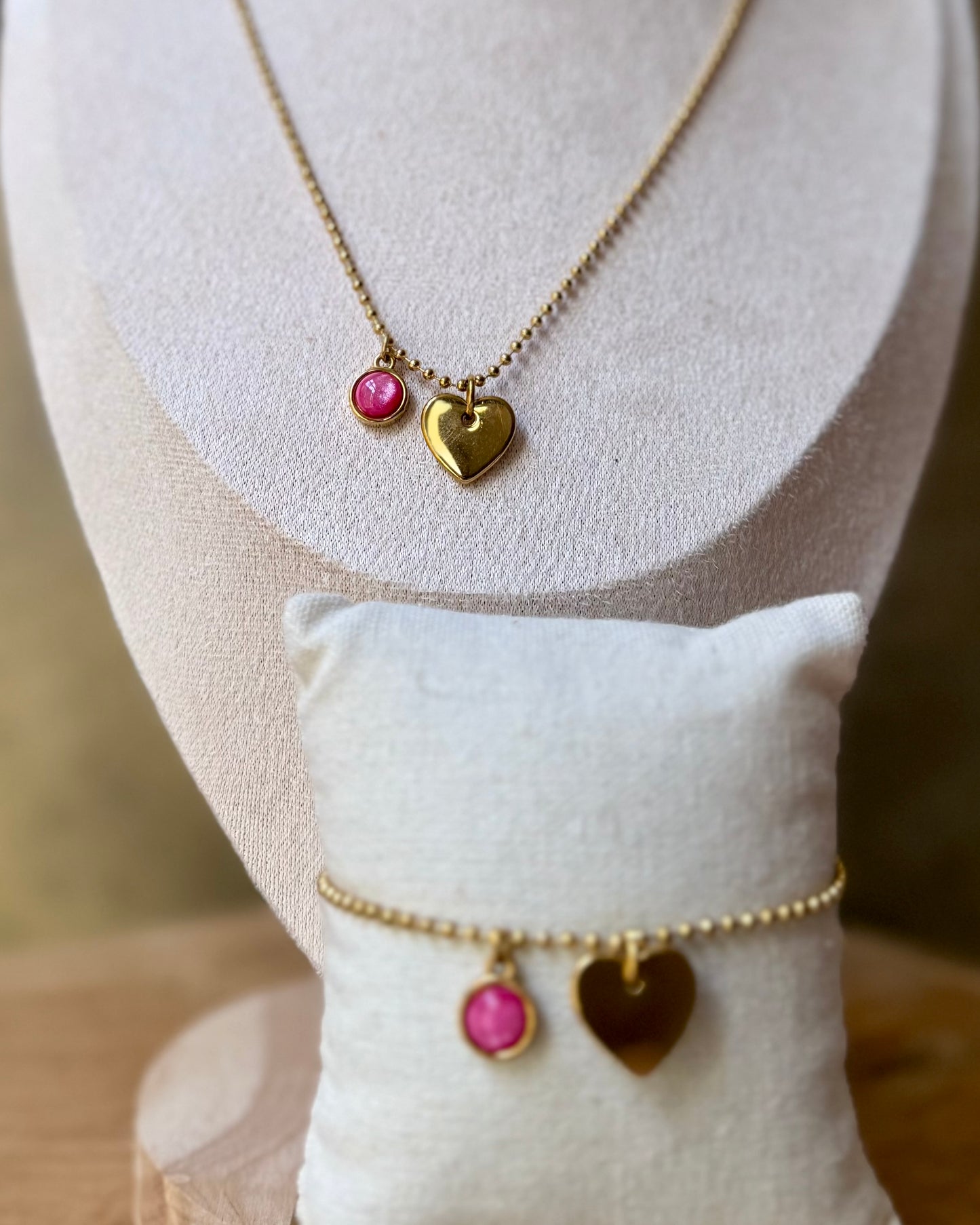 Qoss armband of ketting met hartje