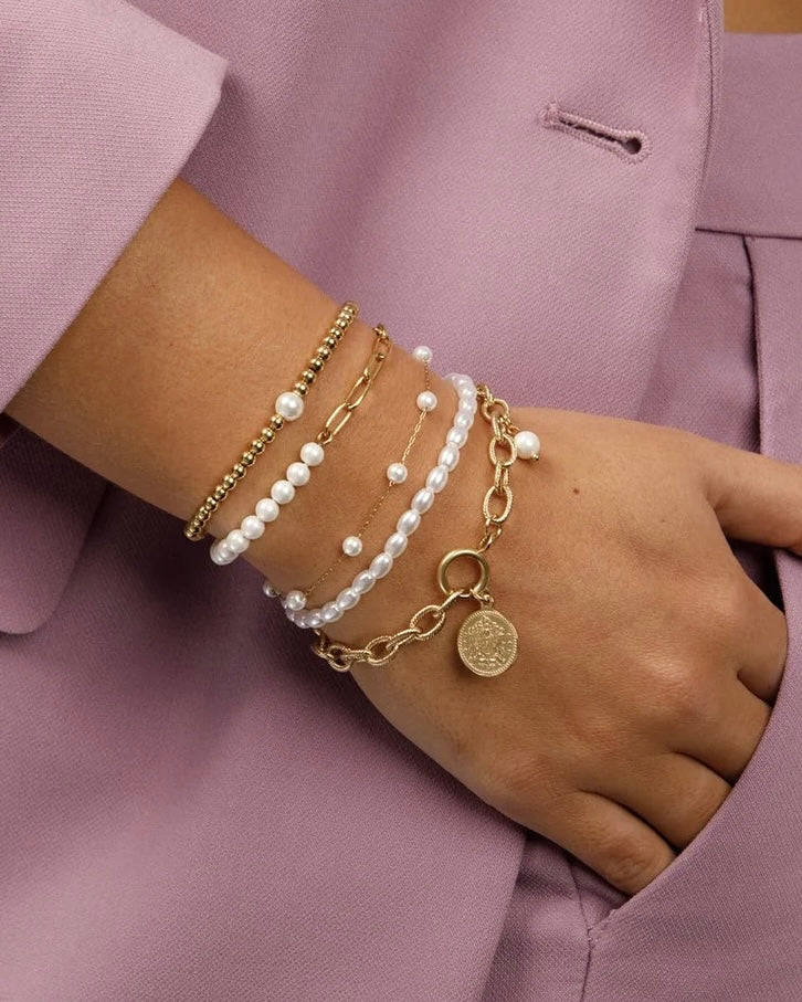 Gouden Kralenarmband met witte parel