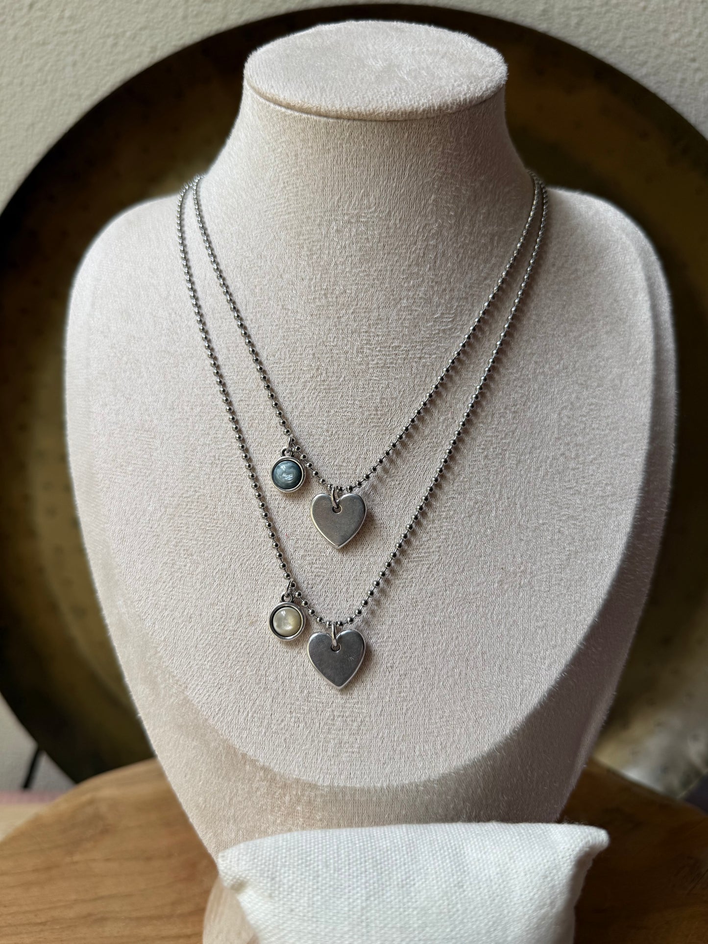 Qoss armband of ketting met hartje